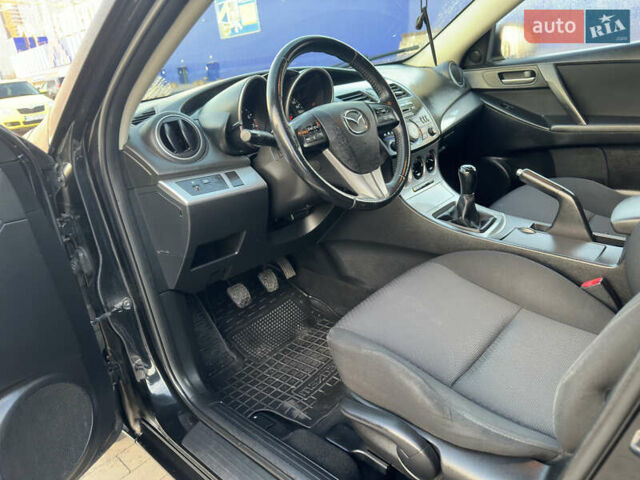 Черный Мазда 3, объемом двигателя 1.6 л и пробегом 127 тыс. км за 7500 $, фото 41 на Automoto.ua