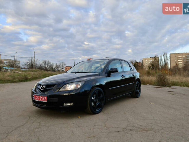Черный Мазда 3, объемом двигателя 1.6 л и пробегом 183 тыс. км за 7499 $, фото 1 на Automoto.ua