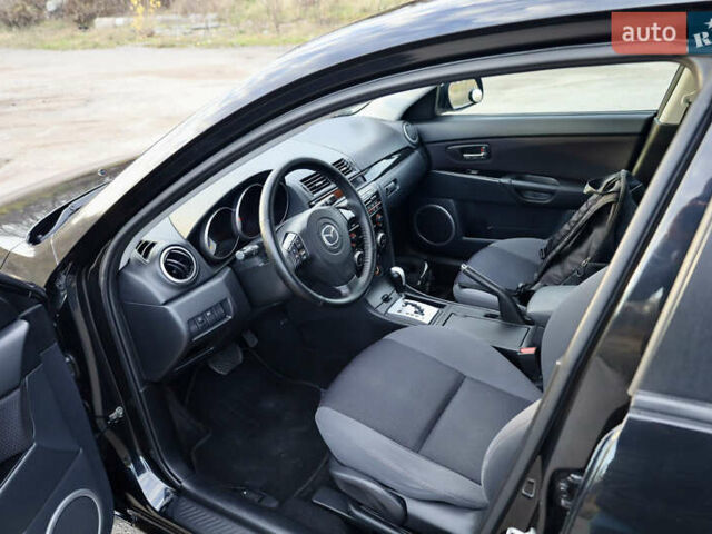 Черный Мазда 3, объемом двигателя 1.6 л и пробегом 183 тыс. км за 7499 $, фото 20 на Automoto.ua