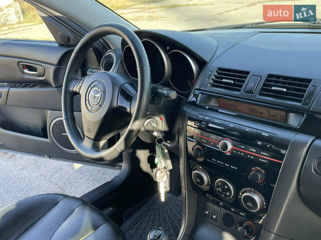 Черный Мазда 3, объемом двигателя 1.6 л и пробегом 107 тыс. км за 7400 $, фото 39 на Automoto.ua