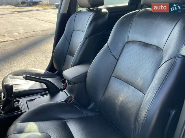 Черный Мазда 3, объемом двигателя 1.6 л и пробегом 107 тыс. км за 7400 $, фото 32 на Automoto.ua