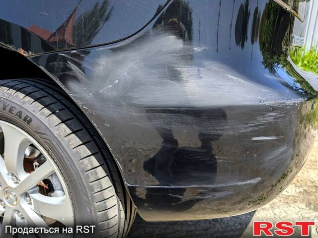 Черный Мазда 3, объемом двигателя 1.6 л и пробегом 217 тыс. км за 4800 $, фото 1 на Automoto.ua