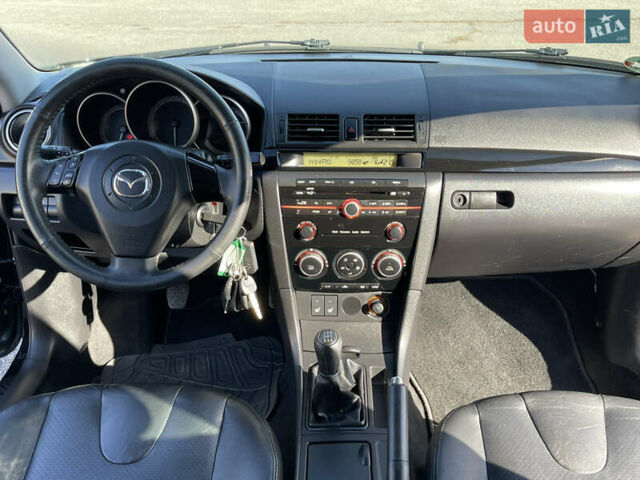 Черный Мазда 3, объемом двигателя 1.6 л и пробегом 107 тыс. км за 7400 $, фото 46 на Automoto.ua