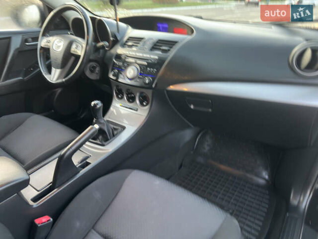 Черный Мазда 3, объемом двигателя 1.6 л и пробегом 127 тыс. км за 7500 $, фото 29 на Automoto.ua