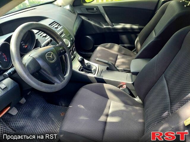 Чорний Мазда 3, об'ємом двигуна 1.6 л та пробігом 299 тис. км за 6800 $, фото 1 на Automoto.ua