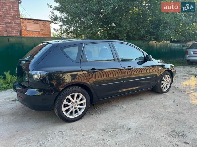 Чорний Мазда 3, об'ємом двигуна 1.6 л та пробігом 194 тис. км за 7350 $, фото 6 на Automoto.ua