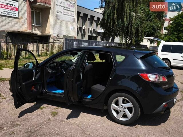 Чорний Мазда 3, об'ємом двигуна 2.18 л та пробігом 224 тис. км за 7000 $, фото 7 на Automoto.ua