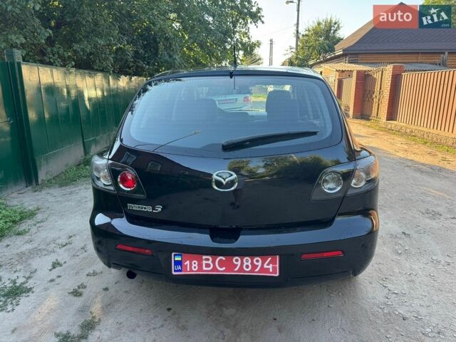 Чорний Мазда 3, об'ємом двигуна 1.6 л та пробігом 194 тис. км за 7350 $, фото 14 на Automoto.ua
