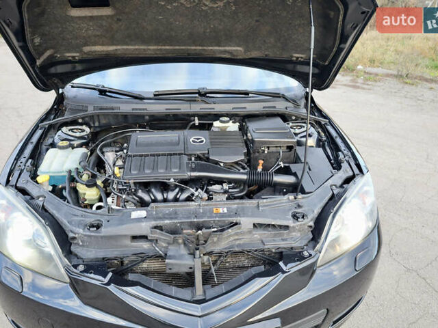 Черный Мазда 3, объемом двигателя 1.6 л и пробегом 183 тыс. км за 7499 $, фото 35 на Automoto.ua