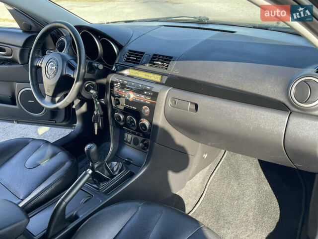 Черный Мазда 3, объемом двигателя 1.6 л и пробегом 107 тыс. км за 7400 $, фото 37 на Automoto.ua