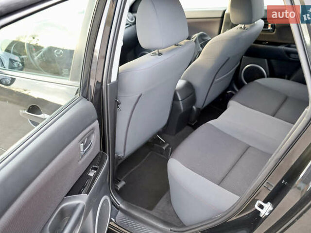 Черный Мазда 3, объемом двигателя 1.6 л и пробегом 183 тыс. км за 7499 $, фото 21 на Automoto.ua