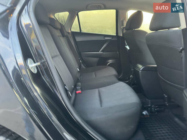 Черный Мазда 3, объемом двигателя 1.6 л и пробегом 127 тыс. км за 7500 $, фото 34 на Automoto.ua