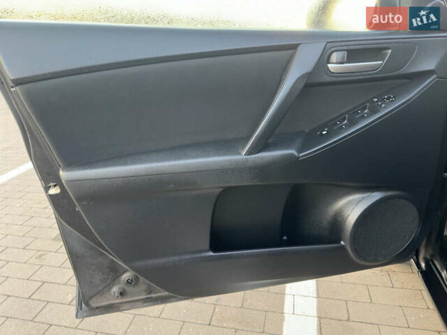Чорний Мазда 3, об'ємом двигуна 1.6 л та пробігом 127 тис. км за 6900 $, фото 40 на Automoto.ua