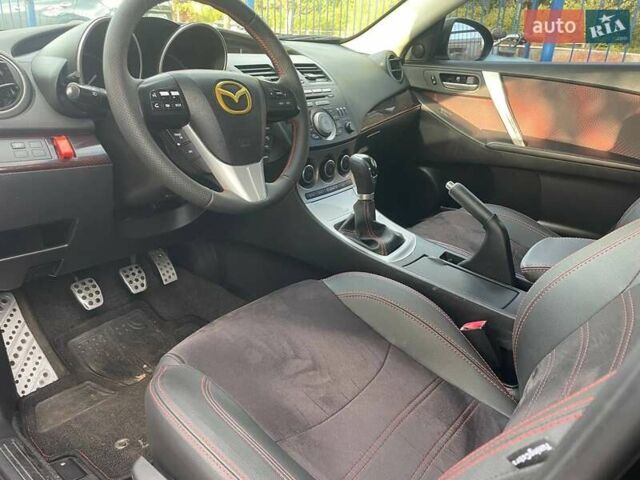 Черный Мазда 3, объемом двигателя 2.3 л и пробегом 194 тыс. км за 11900 $, фото 4 на Automoto.ua