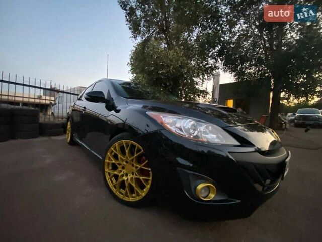 Черный Мазда 3, объемом двигателя 2.3 л и пробегом 194 тыс. км за 11900 $, фото 16 на Automoto.ua