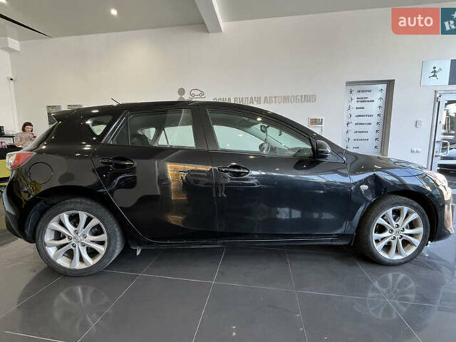 Черный Мазда 3, объемом двигателя 1.6 л и пробегом 219 тыс. км за 6700 $, фото 7 на Automoto.ua