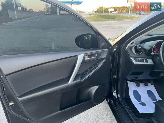 Чорний Мазда 3, об'ємом двигуна 1.6 л та пробігом 213 тис. км за 6900 $, фото 28 на Automoto.ua