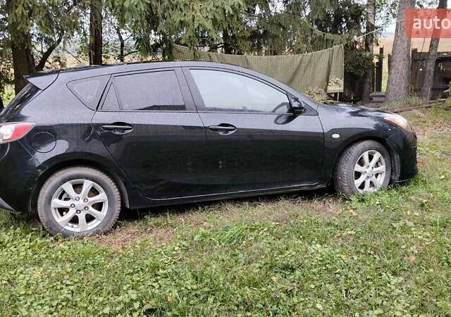 Черный Мазда 3, объемом двигателя 1.59 л и пробегом 170 тыс. км за 7250 $, фото 2 на Automoto.ua