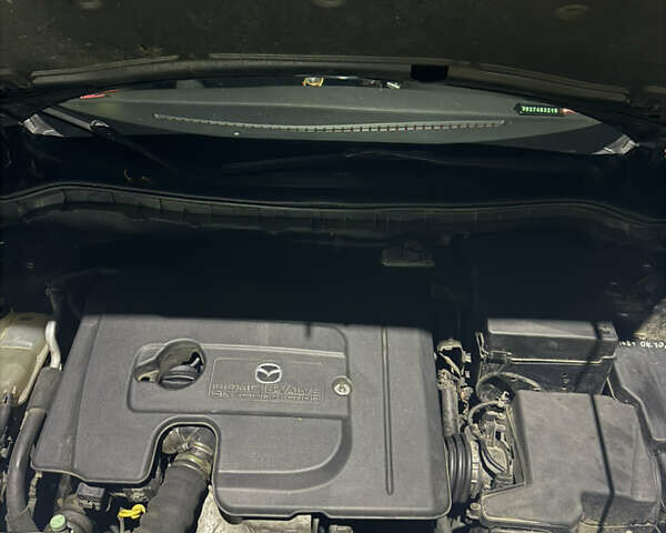 Черный Мазда 3, объемом двигателя 1.56 л и пробегом 243 тыс. км за 6300 $, фото 1 на Automoto.ua