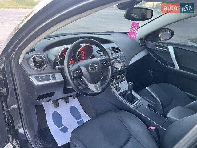 Чорний Мазда 3, об'ємом двигуна 1.6 л та пробігом 213 тис. км за 6900 $, фото 21 на Automoto.ua