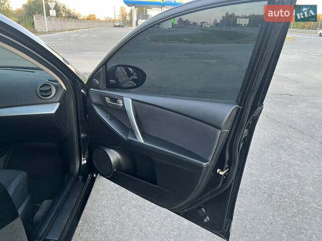Чорний Мазда 3, об'ємом двигуна 1.6 л та пробігом 213 тис. км за 6900 $, фото 35 на Automoto.ua