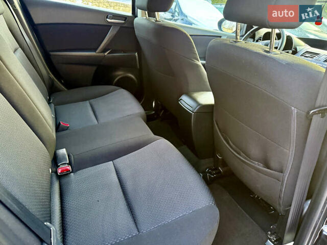 Черный Мазда 3, объемом двигателя 1.6 л и пробегом 185 тыс. км за 6799 $, фото 16 на Automoto.ua