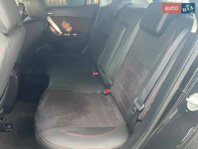 Черный Мазда 3, объемом двигателя 2.3 л и пробегом 194 тыс. км за 11900 $, фото 6 на Automoto.ua