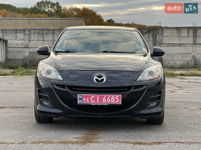 Черный Мазда 3, объемом двигателя 1.6 л и пробегом 205 тыс. км за 7499 $, фото 1 на Automoto.ua