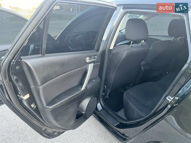 Чорний Мазда 3, об'ємом двигуна 1.6 л та пробігом 213 тис. км за 6900 $, фото 30 на Automoto.ua
