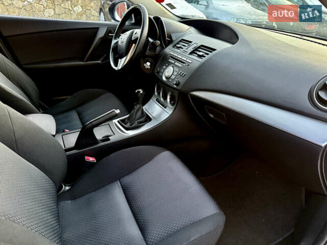 Черный Мазда 3, объемом двигателя 1.6 л и пробегом 185 тыс. км за 6799 $, фото 19 на Automoto.ua