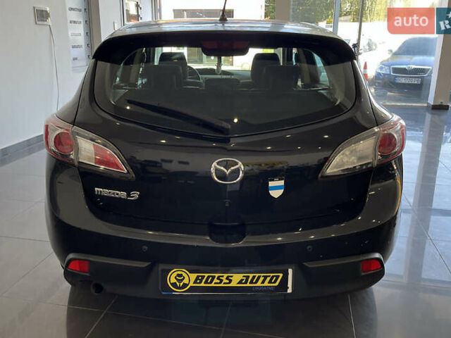 Черный Мазда 3, объемом двигателя 1.6 л и пробегом 219 тыс. км за 6700 $, фото 5 на Automoto.ua