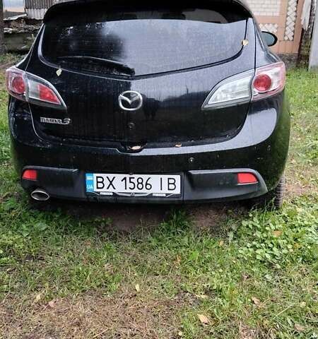 Черный Мазда 3, объемом двигателя 1.59 л и пробегом 170 тыс. км за 7250 $, фото 1 на Automoto.ua