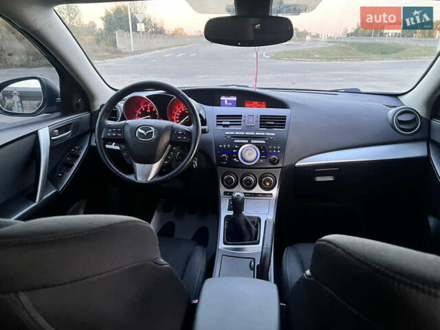 Чорний Мазда 3, об'ємом двигуна 1.6 л та пробігом 213 тис. км за 6900 $, фото 37 на Automoto.ua