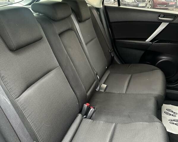 Черный Мазда 3, объемом двигателя 1.6 л и пробегом 296 тыс. км за 6500 $, фото 10 на Automoto.ua