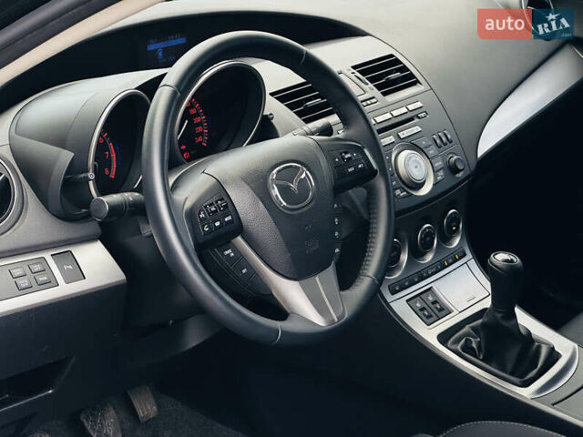 Чорний Мазда 3, об'ємом двигуна 2 л та пробігом 188 тис. км за 8200 $, фото 41 на Automoto.ua