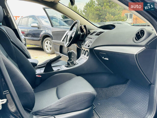 Чорний Мазда 3, об'ємом двигуна 2 л та пробігом 188 тис. км за 8200 $, фото 34 на Automoto.ua