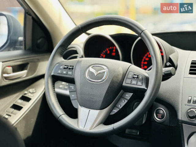 Чорний Мазда 3, об'ємом двигуна 2 л та пробігом 188 тис. км за 8200 $, фото 24 на Automoto.ua