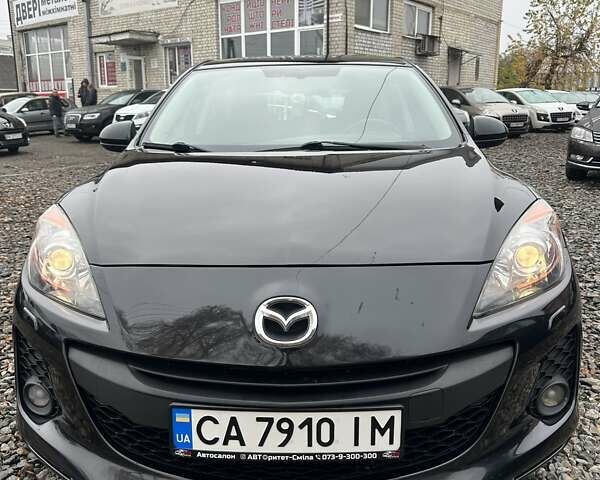 Черный Мазда 3, объемом двигателя 1.6 л и пробегом 296 тыс. км за 6500 $, фото 3 на Automoto.ua