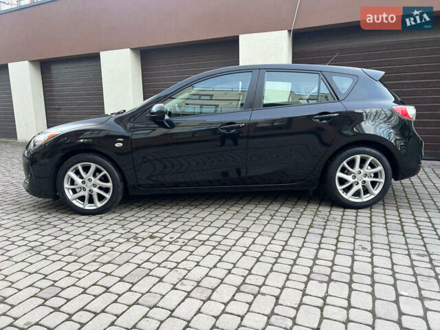 Черный Мазда 3, объемом двигателя 1.6 л и пробегом 145 тыс. км за 7799 $, фото 4 на Automoto.ua