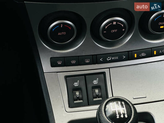 Чорний Мазда 3, об'ємом двигуна 2 л та пробігом 188 тис. км за 8200 $, фото 30 на Automoto.ua