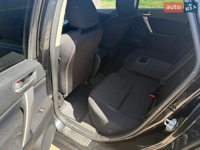 Черный Мазда 3, объемом двигателя 2 л и пробегом 193 тыс. км за 7700 $, фото 9 на Automoto.ua