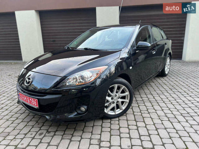 Черный Мазда 3, объемом двигателя 1.6 л и пробегом 145 тыс. км за 7799 $, фото 1 на Automoto.ua