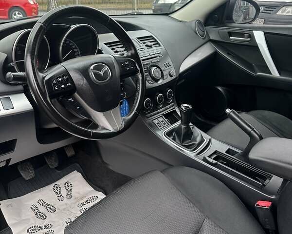 Черный Мазда 3, объемом двигателя 1.6 л и пробегом 296 тыс. км за 6500 $, фото 17 на Automoto.ua