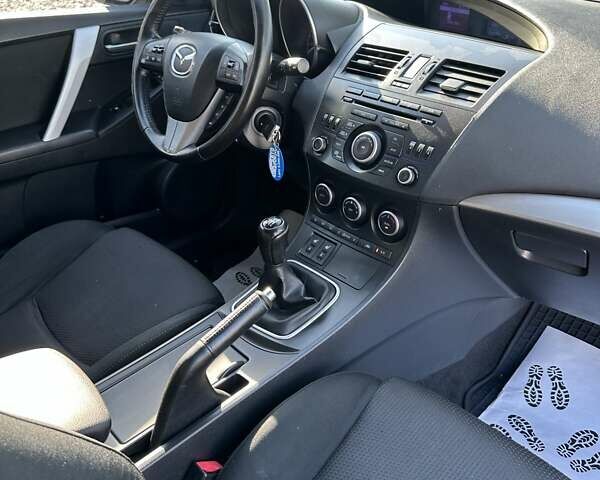 Черный Мазда 3, объемом двигателя 1.6 л и пробегом 296 тыс. км за 6800 $, фото 18 на Automoto.ua