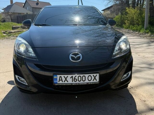 Черный Мазда 3, объемом двигателя 2 л и пробегом 193 тыс. км за 7700 $, фото 4 на Automoto.ua