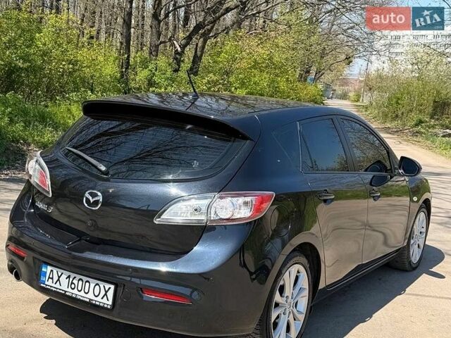 Черный Мазда 3, объемом двигателя 2 л и пробегом 193 тыс. км за 7850 $, фото 3 на Automoto.ua