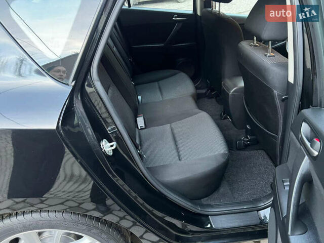 Чорний Мазда 3, об'ємом двигуна 1.6 л та пробігом 145 тис. км за 7599 $, фото 18 на Automoto.ua