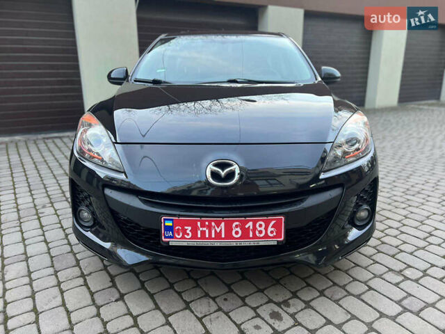 Черный Мазда 3, объемом двигателя 1.6 л и пробегом 145 тыс. км за 7799 $, фото 12 на Automoto.ua