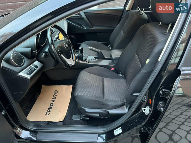 Черный Мазда 3, объемом двигателя 1.6 л и пробегом 145 тыс. км за 7799 $, фото 16 на Automoto.ua