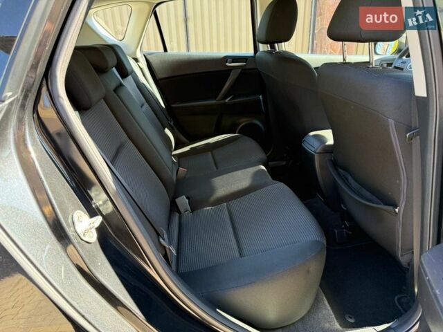 Чорний Мазда 3, об'ємом двигуна 2 л та пробігом 193 тис. км за 8762 $, фото 51 на Automoto.ua